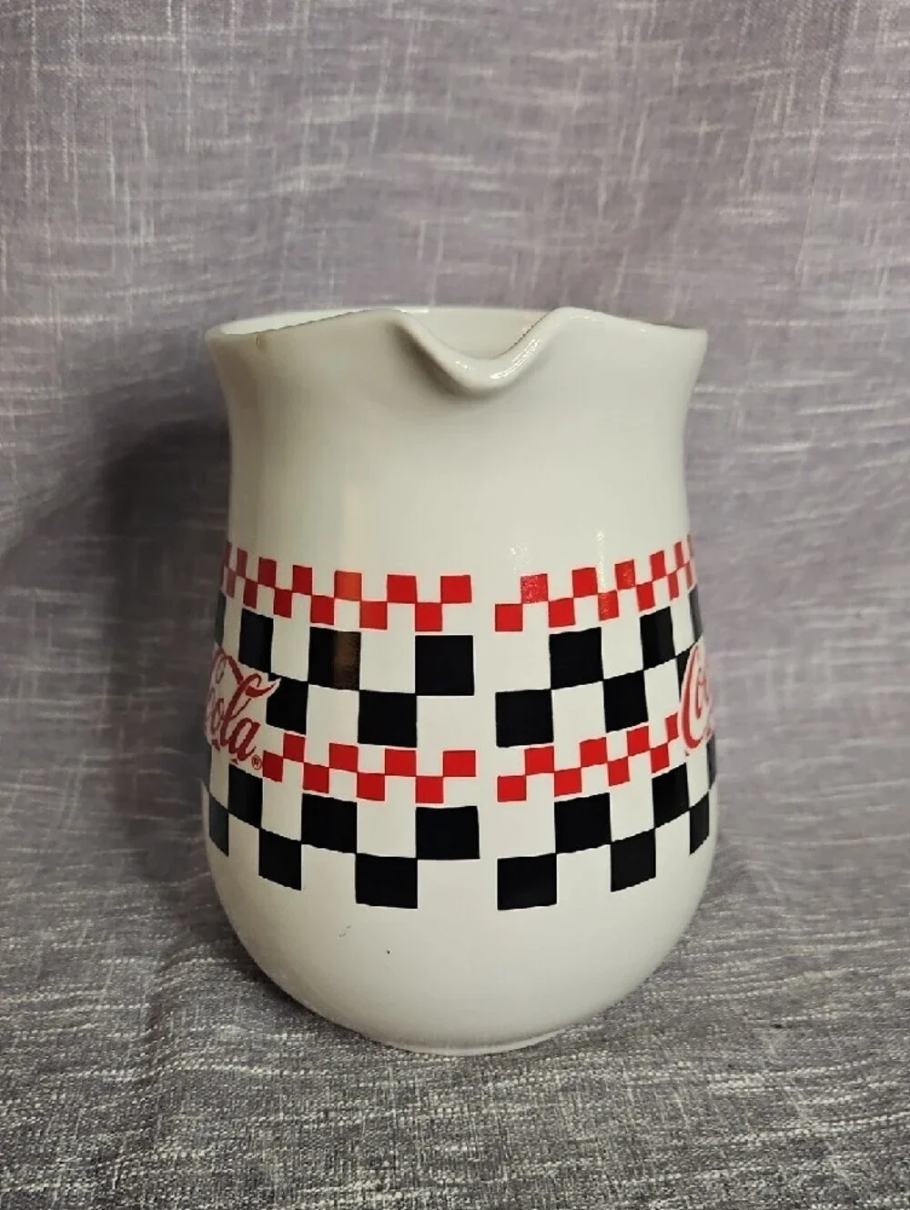 Coca-Cola White Ceramic Pitcher with Red Logo and Black Checkerboard